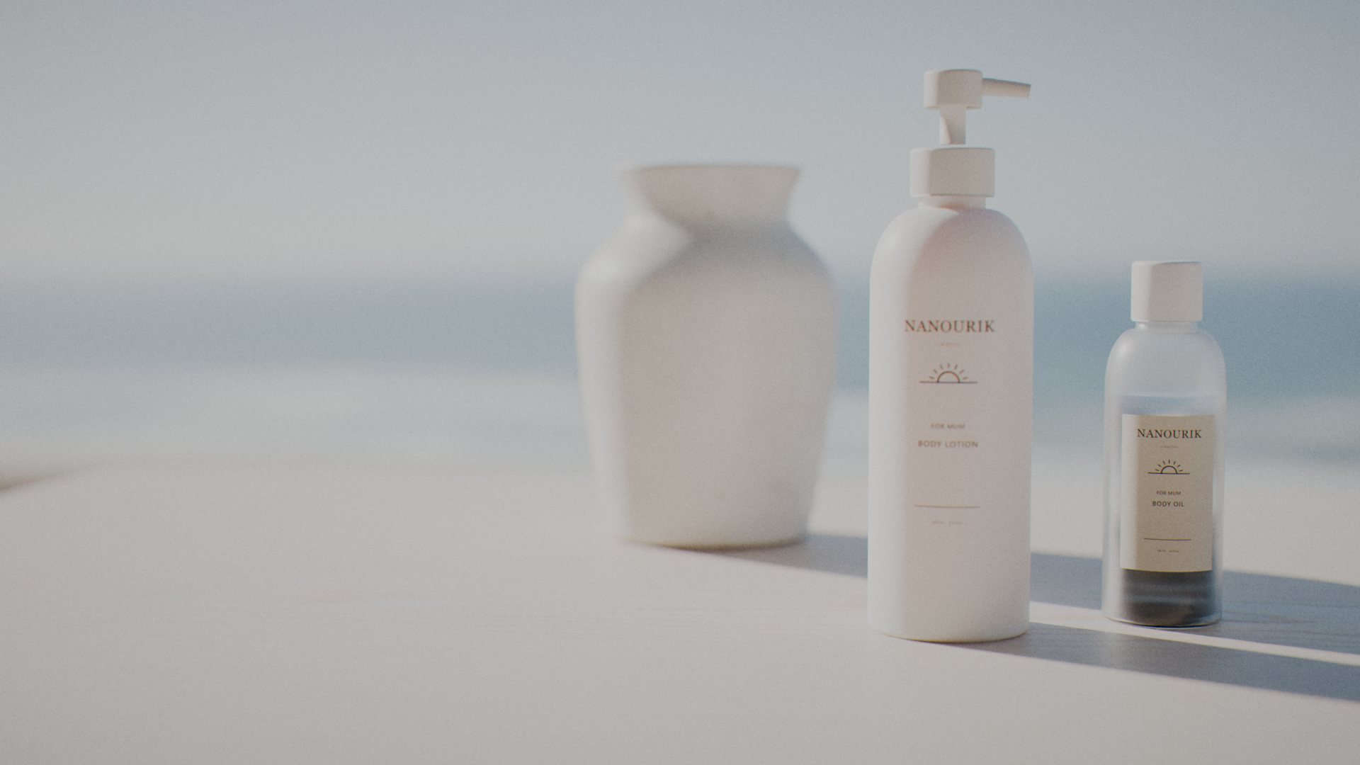 Nanourik body lotion and body oil on a sunlit shelf by the sea